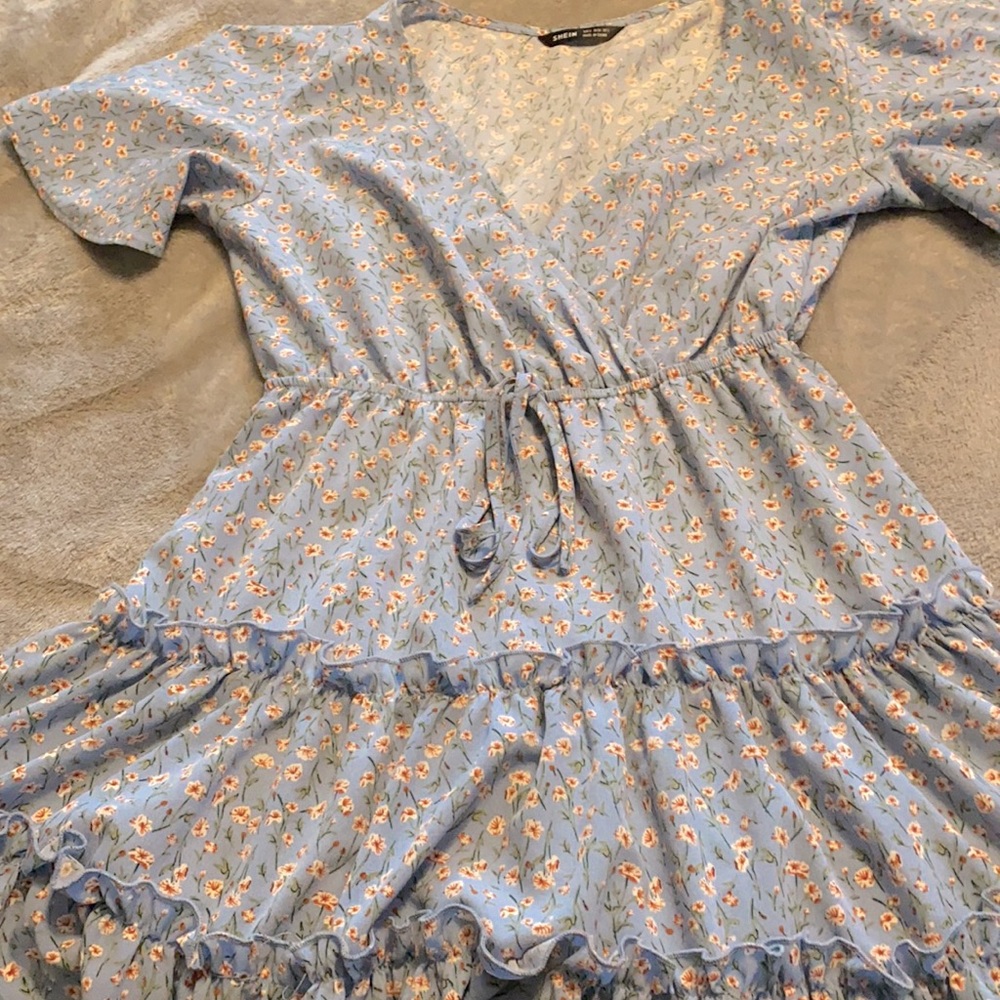 Summer dress fitted around the waist